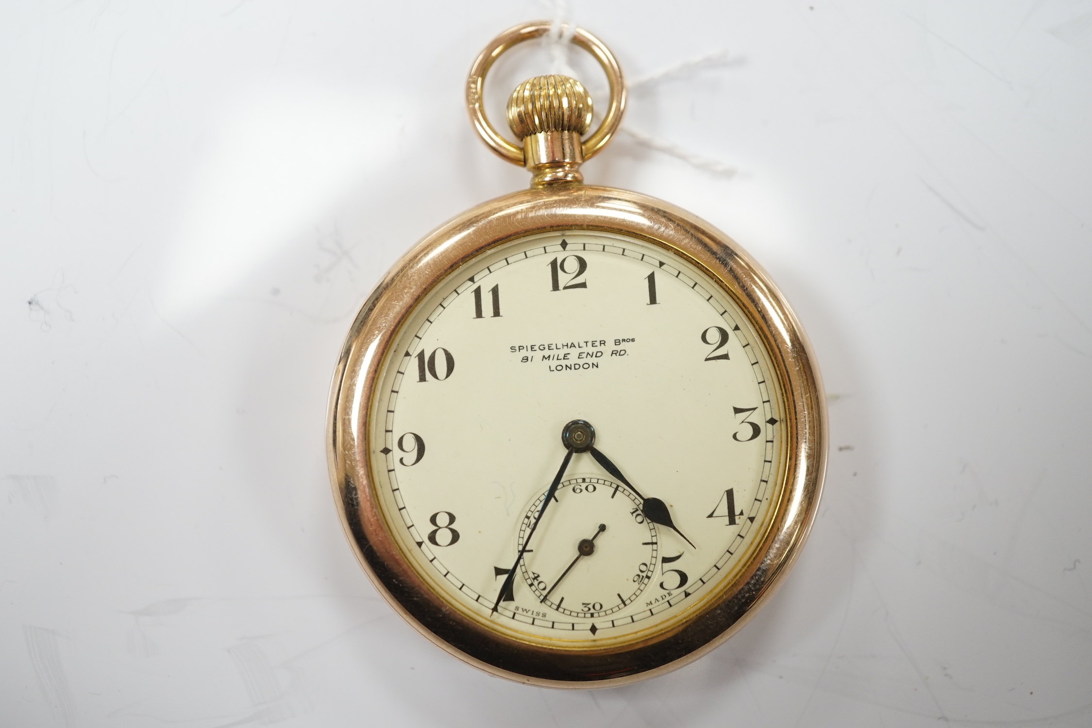 An early 20th century 9ct gold open face pocket watch, retailed by Spiegelhalter Bros, with Arabic dial and subsidiary seconds, case diameter 47mm, gross weight 61.2 grams.